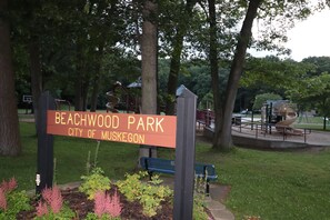 half block to swing sets, athletic stations, fire pit, soccer, and to the beach
