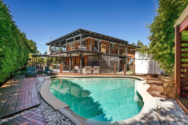 Make the most of this large pool and lounge in the sun