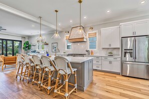 Gourmet Kitchen features High End Cabinets and Stainless Steel Appliances
