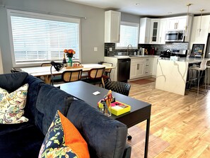 Open concept living room, dining room, kitchen