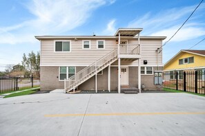 Here's a peek at the driveway and access code keypad, offering easy entry to your home away from home. Feel the excitement as you pull in, knowing that relaxation and convenience are just moments away.