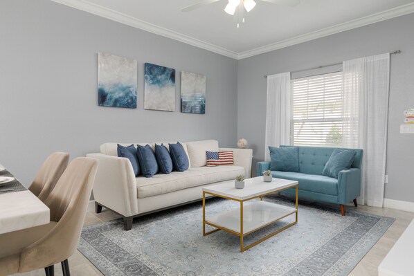 Spacious and beautiful living room offering ample comfort and style.