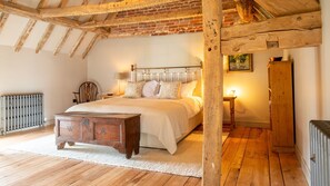 Bedroom one at the Coach House with a king-size bed