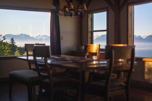 Immerse yourself in the Kachemak Mountains while gathering around the table.