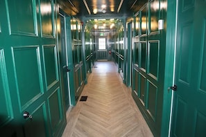 Hallway to each of the private suites