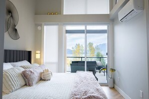 The primary bedroom offers stunning views.