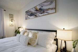 Tastefully decorated master bedroom with en-suite bathroom.