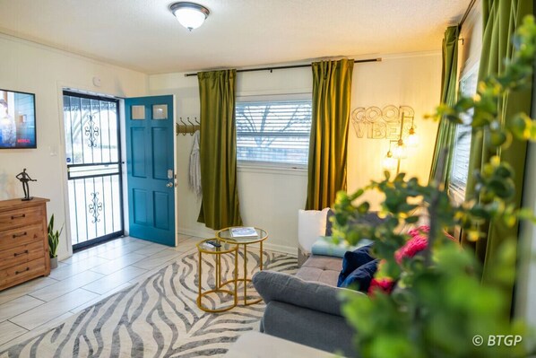 Chic studio featuring a pull-out couch for extra comfort.