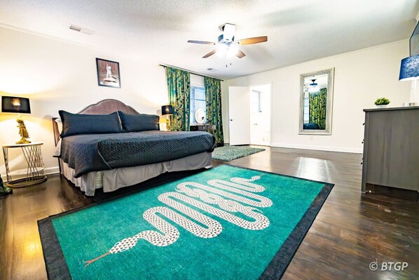 Experience regal comfort in the King's master suite, complete with an attached bathroom and a private patio entrance.