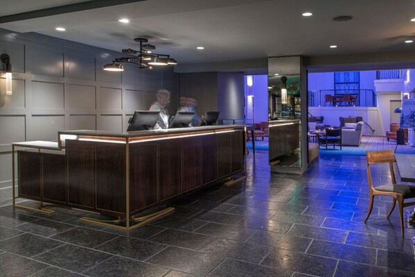 A warm welcome awaits at Theodore’s front desk, your first stop to a memorable stay.