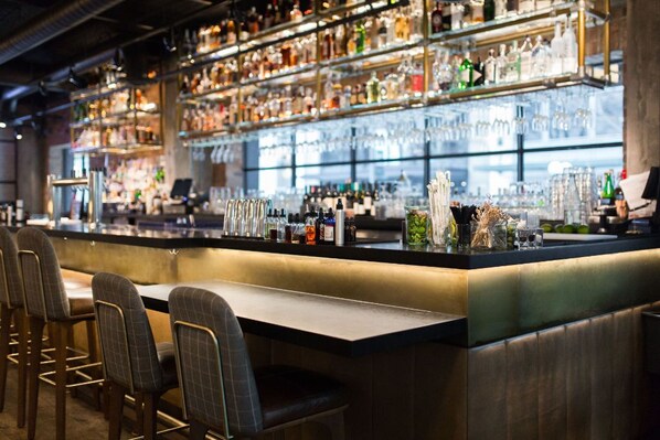 Savor handcrafted cocktails in our chic bar, perfect for evening socials or a nightcap.