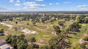 Tour Area Golf Courses Across Street By Helicopter