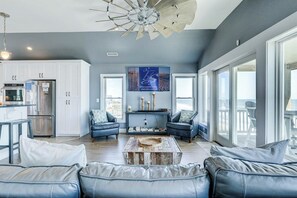 Top-Level Living Room with Deck Access