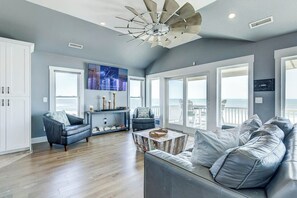 Top-Level Living Room with Deck Access