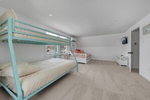 Bunk bed room with twin over full bunk bed and full daybed with twin trundle.