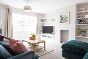 The stylish and comfortable living room has smart TV to enjoy all your favourite tv shows or films.