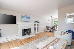 Drift seamlessly between the living and dining rooms
