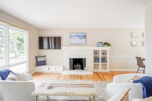 Enjoy the bright and airy living room during your stay.