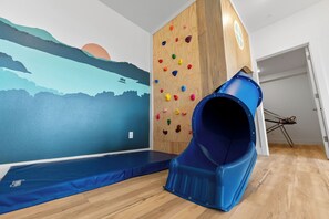 You kids will love the INDOOR slide inside the home!