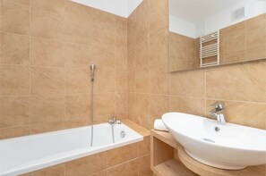 Bathroom with a washing machine