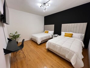 There are 4 bedrooms each with 2 double beds