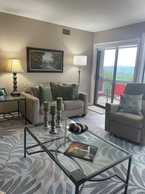 Living Room with balcony entrance.