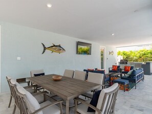 Outdoor kitchen & TV lounge area.