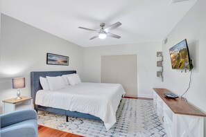 Master bedroom with king bed, walk-in closet and ensuite bath