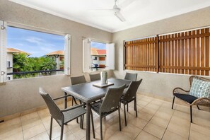 Take in the scenic views from the private balcony, overlooking the pool. It’s a great spot for outdoor dining or simply enjoying the serene atmosphere.