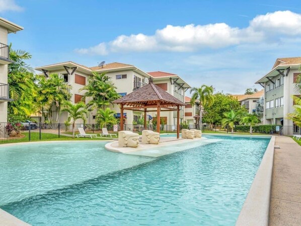 Dive into one of the three large tropical pools, perfect for cooling off on a hot day or lounging under the shaded gazebo with a good book.