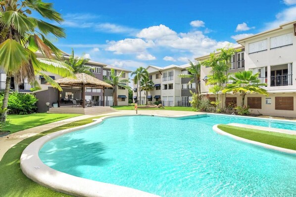 Take a refreshing dip in the resort-style pool, or relax under the shaded gazebos. 