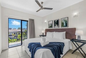 Unwind in the spacious bedroom, boasting a king-size bed for a restful night’s sleep.