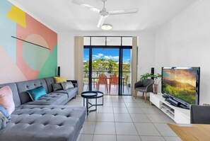 The living area is perfect for unwinding after a day exploring Tropical North Queensland, with air conditioning ensuring your comfort.