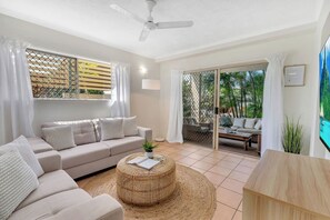 The cosy lounge area offers two large sofas where guests can settle in with a movie.
