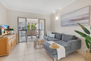 Enjoy the seamless flow to the private balcony, where you can unwind with breathtaking views of the resort-style pool.