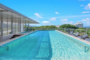 Enjoy a swim in the scenic pool, an ideal way to unwind after a day exploring Cairns.