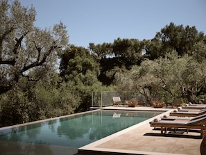 The secluded, enclosed gardens and large outdoor pool.