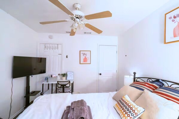 Gaze into your private bedroom with a queen-sized bed!