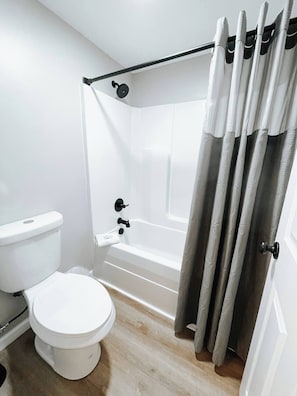Take a rejuvenating soak in the tub while enjoying the soft glow of ambient lighting, or pamper yourself with our selection of premium bath amenities.