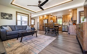 Open living and dining area with Smart TV.