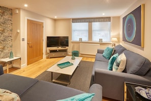Cosy Lounge Area with TV