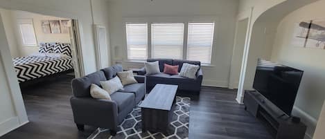 main common area with Bedroom 1 door open