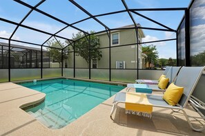 Pool with sun loungers