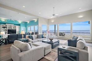 Bright living area with cozy seating and plenty of natural light