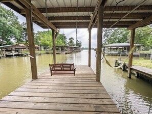 Catch the sunset from the swing at the boat house. It is a gorgeous view!
