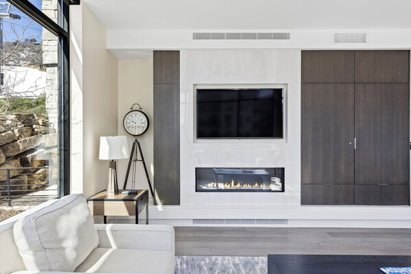Enjoy the warmth of the gas fireplace while streaming your favorite show.