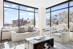 Enjoy the comfortable couch in the living room while watching TV and enjoying the beautiful views.