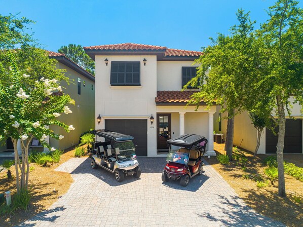 Front of Home & Two Golf Carts