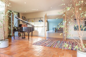 Mill Hill, Tittleshall Barns: Entrance hall with piano