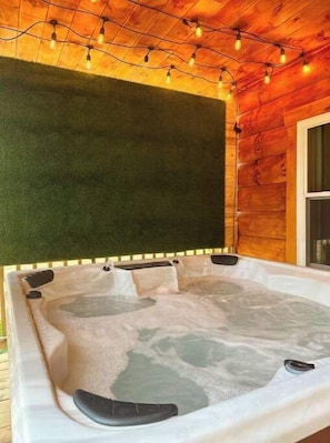 Hot Tub with a cozy setting.